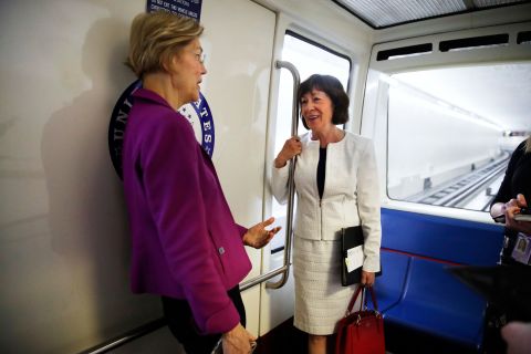 Warren and US Sen. Susan Collins ride the Senate subway in June 2018.