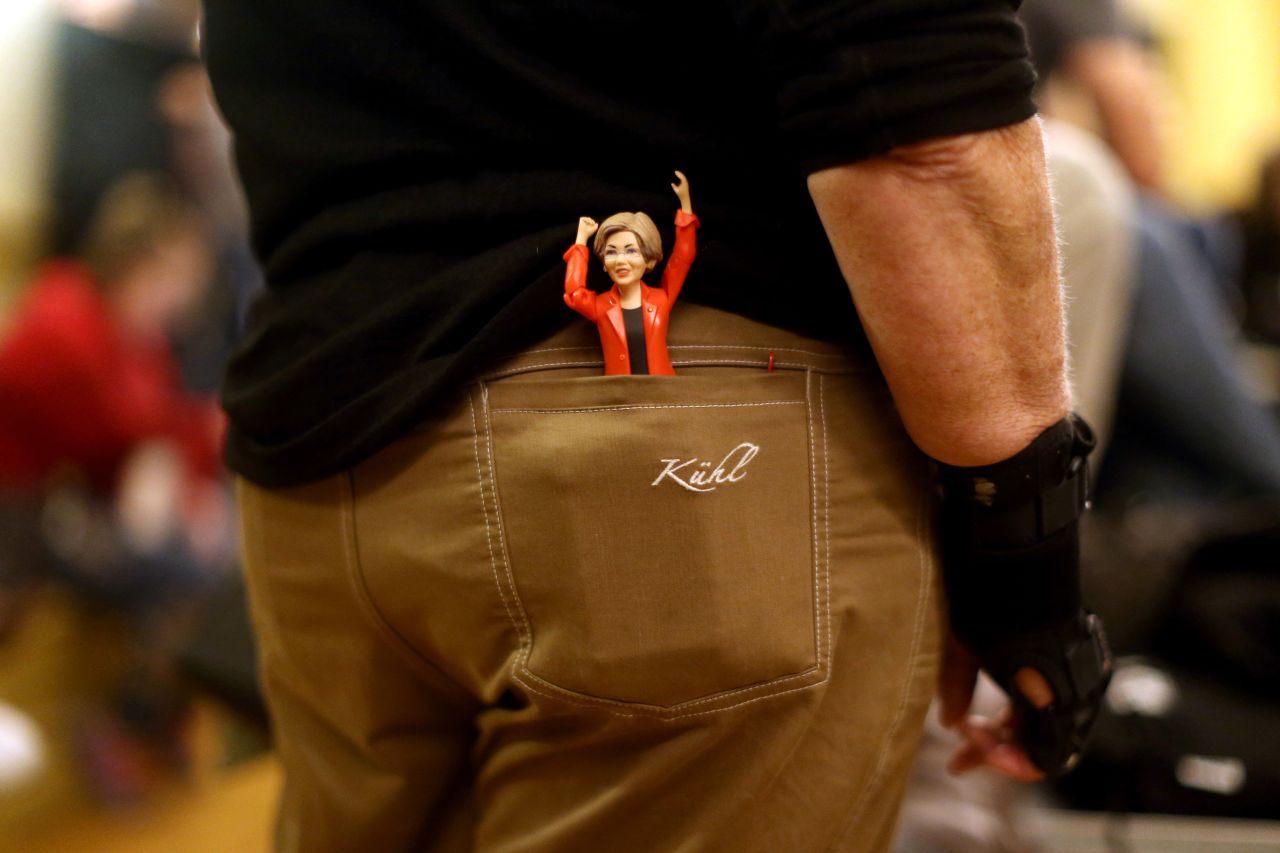 A Warren figurine sits in the back pocket of Mary Jo Kane during a town-hall event in Boston in October 2018.