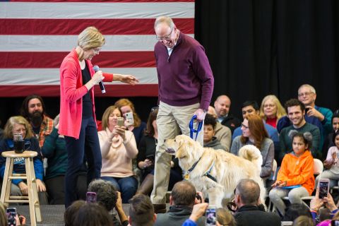 Warren, her husband and dog Bailey attend an event in Manchester, New Hampshire, in January 2019. Warren had recently announced that she was forming an exploratory committee for the 2020 presidential race.