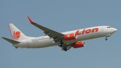 A Lion Air Boeing 737-800 plane flies over the Sukarno-Hatta airport in Tangerang outside Jakarta on March 18, 2013. European aerospace giant Airbus will sign on March 18 what would mark one of its biggest orders ever from Indonesia's Lion Air for more than 200 A320 medium-haul jets, business daily Les Echos reported.    AFP PHOTO / ADEK BERRY        (Photo credit should read ADEK BERRY/AFP/Getty Images)