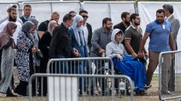 13-year-old Zaid Mustafa (in wheelchair) whose father and brother were killed in the Christchurch terrorist attack, attends a funeral at Memorial Park Cemetery on March 20, 2019 in Christchurch, New Zealand. 