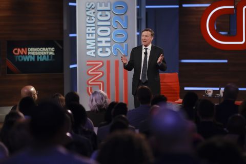 Hickenlooper addresses a crowd in Atlanta at his CNN town hall in March 2019.