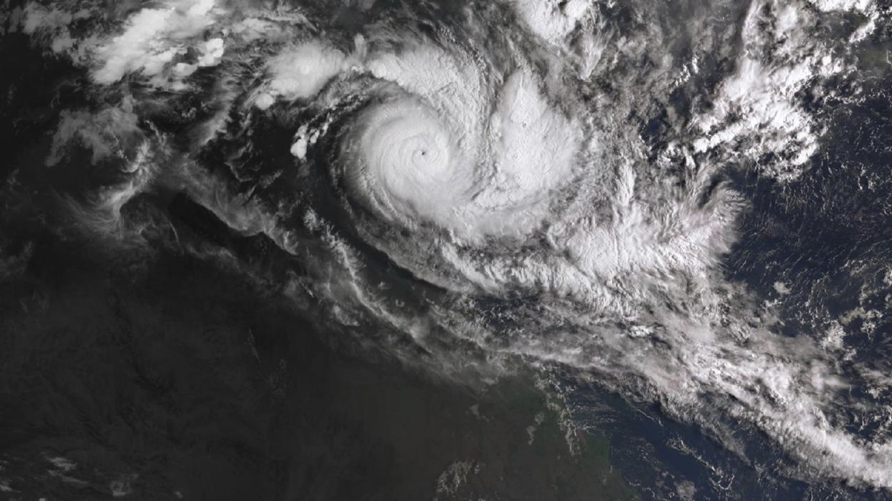 In a satellite image acquired from the Australian Bureau of Meteorology, Cyclone Trevor moves over Australia's Northern Territory on Tuesday.