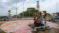 View of the "Zumaque I" pumpjack with which production was started in 1914 in Mene Grande, Zulia state, Venezuela on March 15, 2019. - Production cutbacks by OPEC nations are building a supply cushion that could be called upon to mitigate a possible supply shock from an abrupt drop in crisis-hit Venezuela's output, the International Energy Agency (IEA) said Friday. (Photo by Juan BARRETO / AFP)        (Photo credit should read JUAN BARRETO/AFP/Getty Images)