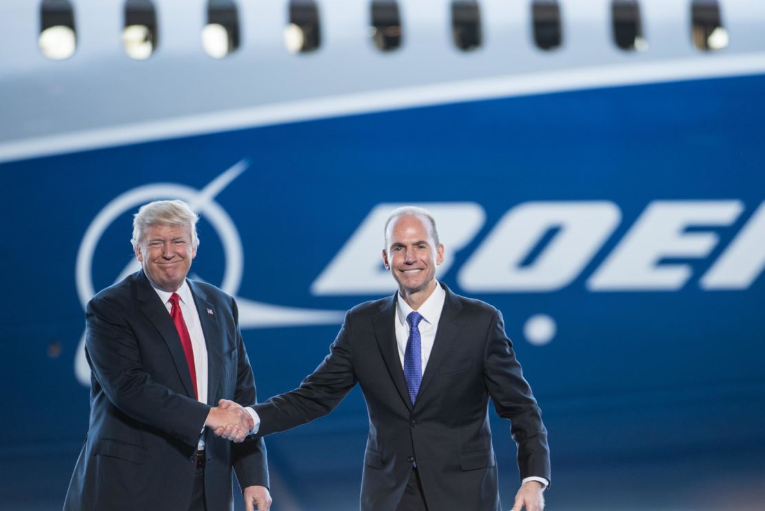 Boeing CEO Dennis Muilenburg shakes hands with President Donald Trump at the 787 kickoff event in 2017.