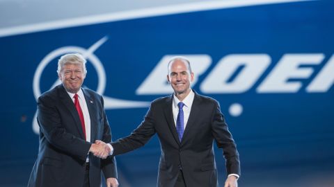 Boeing CEO Dennis Muilenburg shakes hands with President Donald Trump at the 787 kickoff event in 2017.