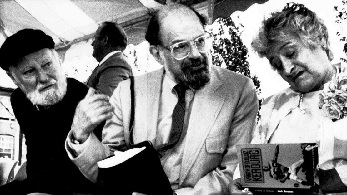 Poets Lawrence Ferlinghetti, left, and Allen Ginsberg, center, look on with Stella Kerouac, Jack's widow, in 1988.