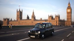 LONDON, ENGLAND - MARCH 28:  A black taxi cab makes its way over Westminster Bridge on March 28, 2012 in London, England.  (Photo by Dan Kitwood/Getty Images)