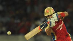 Royal Challengers Bangalore batsman Virat Kohli plays a shot during the IPL Twenty20 cricket match between Deccan Chargers and Royal Challengers Bangalore at Rajiv Gandhi International Stadium in Hyderabad on May 20, 2012.  RESTRICTED TO EDITORIAL USE. MOBILE USE WITHIN NEWS PACKAGE AFP PHOTO/Noah SEELAM        (Photo credit should read NOAH SEELAM/AFP/GettyImages)