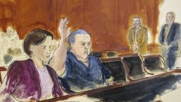 FILE- In this Nov. 6, 2018, file courtroom sketch, pipe bombs suspect Cesar Sayoc raises his arm to swear to the truth of his statement of need for assigned counsel, at Federal Court in New York. Sayoc, who is charged with sending pipe bombs to prominent critics of President Donald Trump, is expected to plead guilty at a hearing in New York on Thursday, March 21, 2019. (Elizabeth Williams via AP, File)