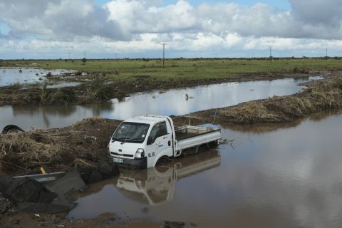 A vehicle is submerged in floodwaters on March 21 after it got swept away by Cyclone Idai in Nyamatanda, Mozambique.