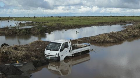 A vehicle is submerged in floodwaters on March 21 after it got swept away by Cyclone Idai in Nyamatanda, Mozambique.