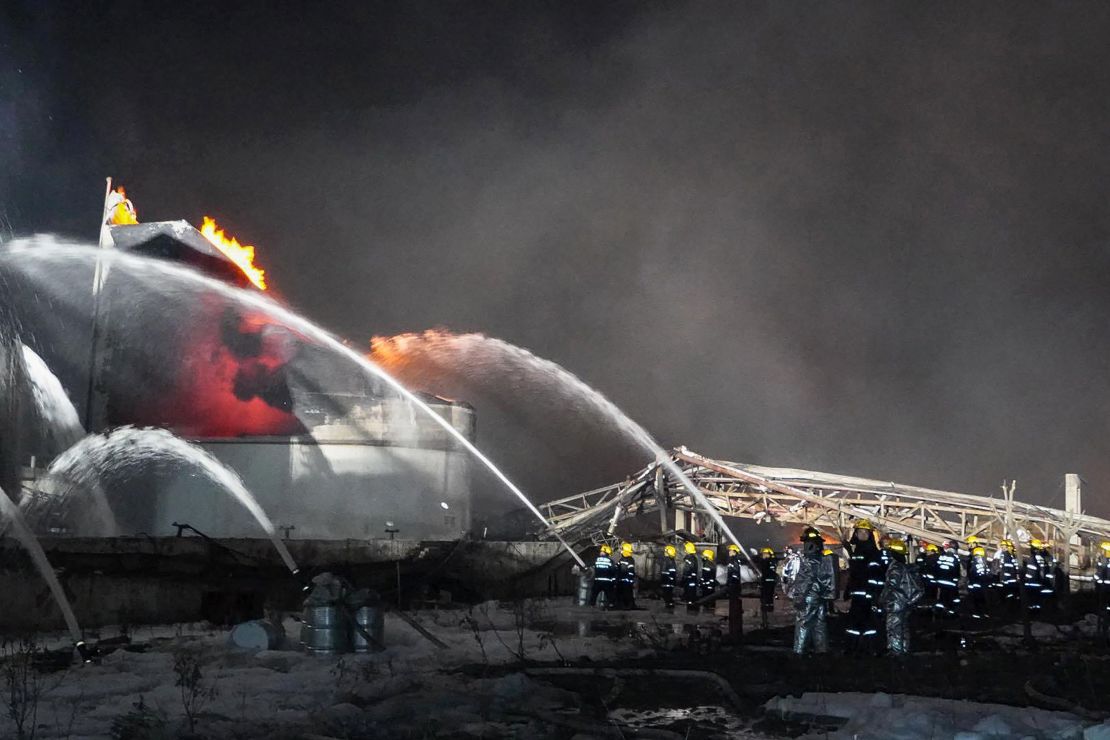 Firemen work following an explosion at a chemical plant in Yancheng in China's eastern Jiangsu province early on March 22, 2019.