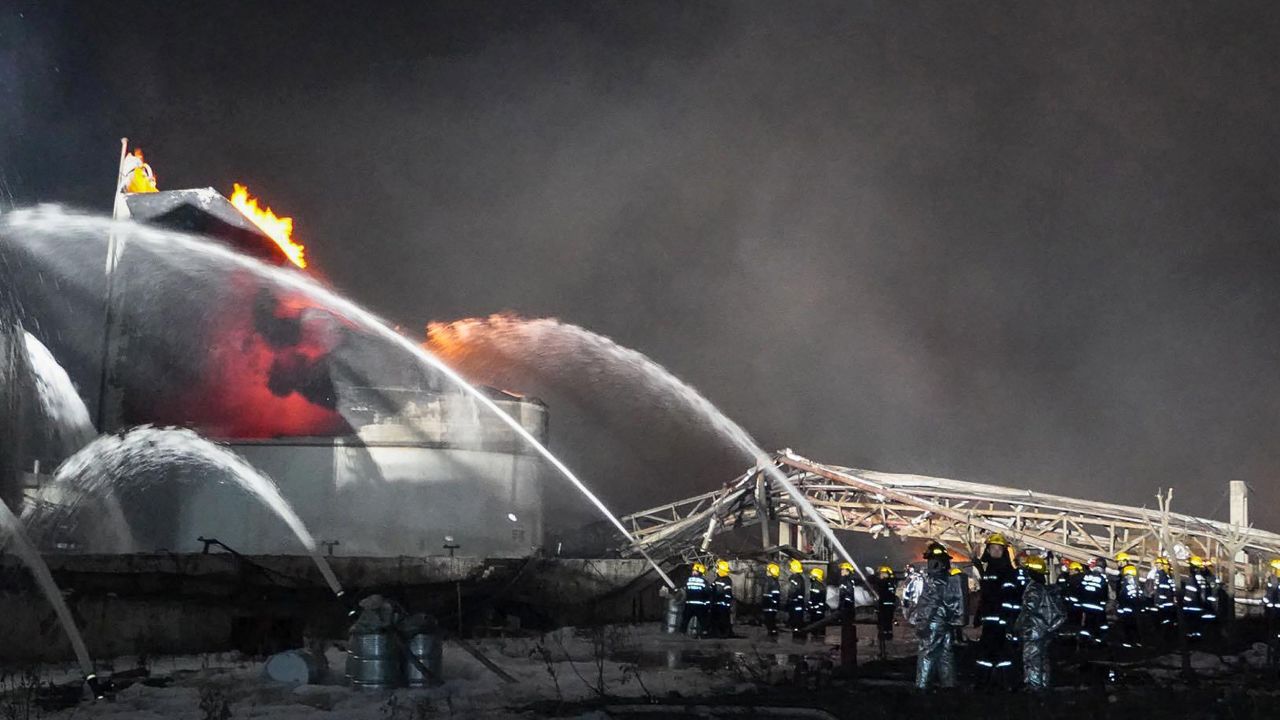 Firemen work following an explosion at a chemical plant in Yancheng in China's eastern Jiangsu province early on March 22, 2019.