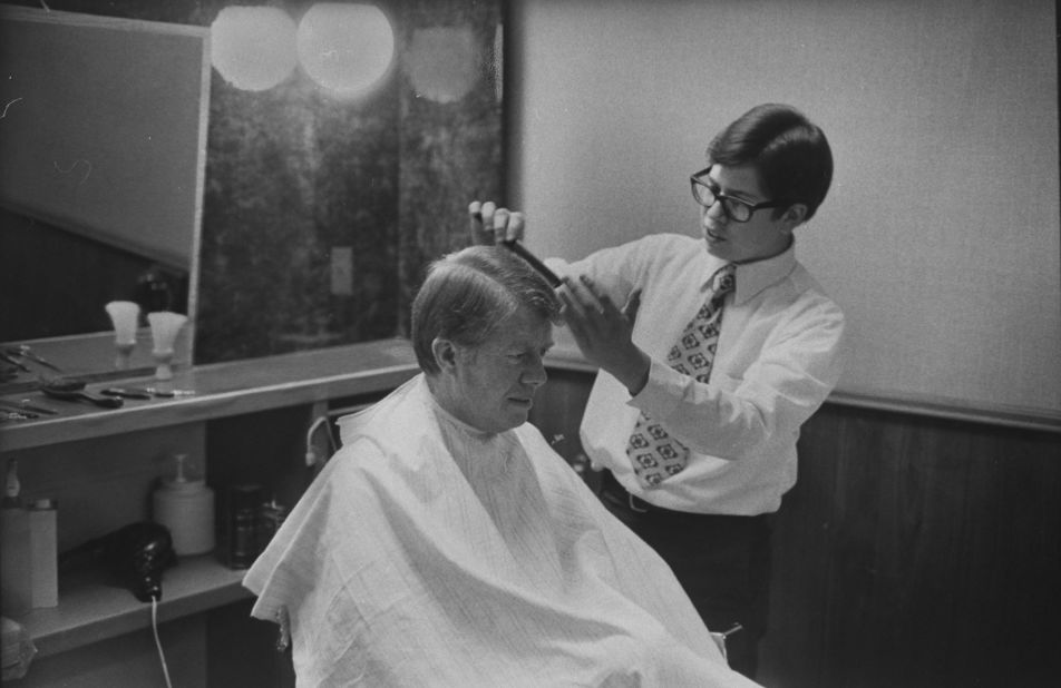 Carter gets a haircut during his first year as governor of Georgia. He was inaugurated on January 12, 1971.