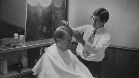 Carter gets a haircut during his first year as governor of Georgia. He was inaugurated on January 12, 1971.