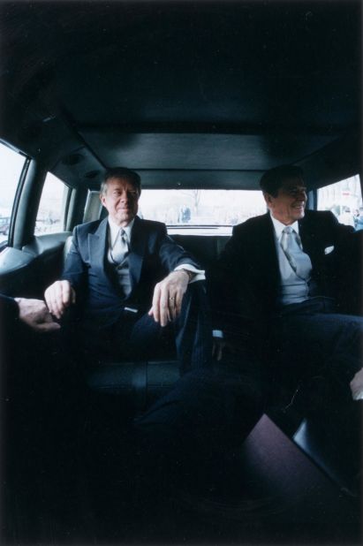 Outgoing President Carter, left, sits with President-elect Ronald Reagan en route to Reagan's inauguration in January 1981.