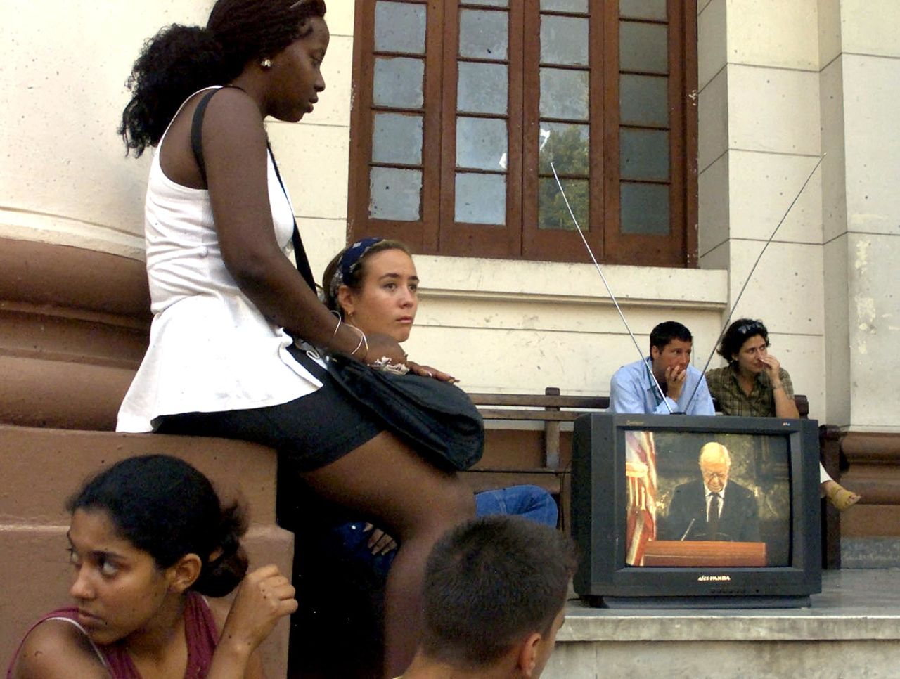 Students at the University of Havana listen to Carter outline his vision for improved relations between the United States and Cuba on May 14, 2002. The speech was broadcast live and uncensored on Cuban state television.