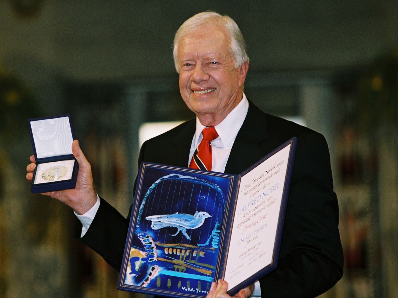 Carter is awarded the Nobel Peace Prize in Oslo, Norway, in December 2002. He was recognized for his many years of public service, and in his acceptance speech he urged others to work for peace.