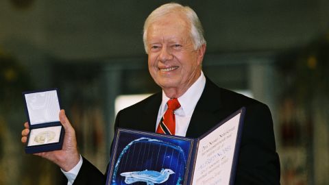 Carter is awarded the Nobel Peace Prize in Oslo, Norway, in December 2002. He was recognized for his many years of public service, and in his acceptance speech he urged others to work for peace.