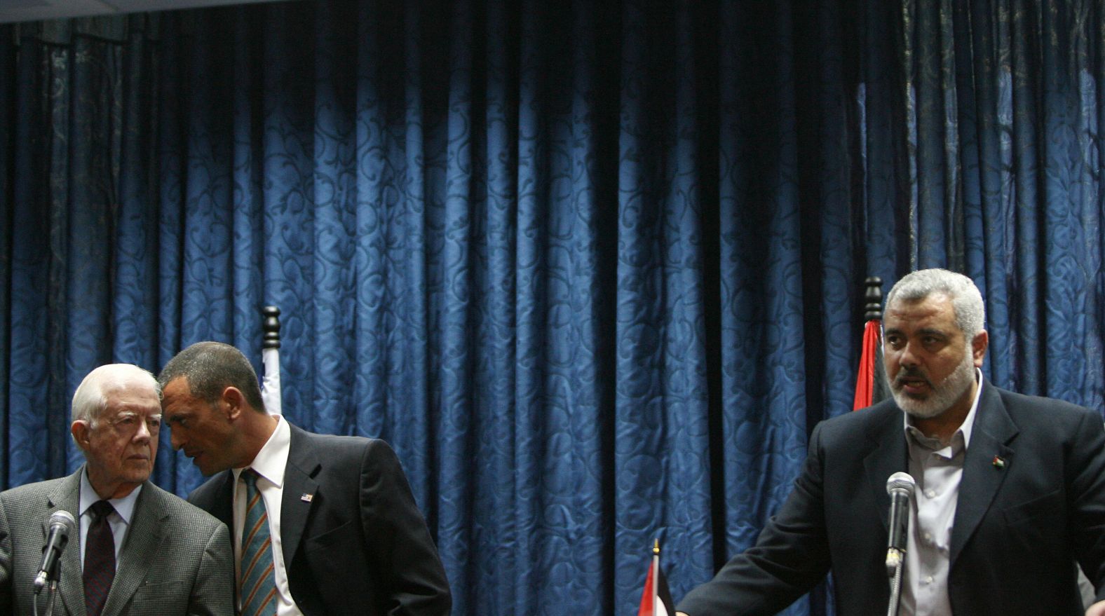 Hamas leader Ismail Haniya speaks in June 2009 during a joint news conference with Carter in Gaza. Carter denounced the deprivations facing Palestinians in Gaza as unique in history, asserting that they are being treated "like animals."