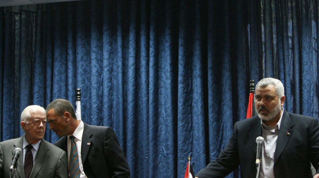 Hamas leader Ismail Haniya speaks in June 2009 during a joint news conference with Carter in Gaza. Carter denounced the deprivations facing Palestinians in Gaza as unique in history, asserting that they are being treated "like animals."