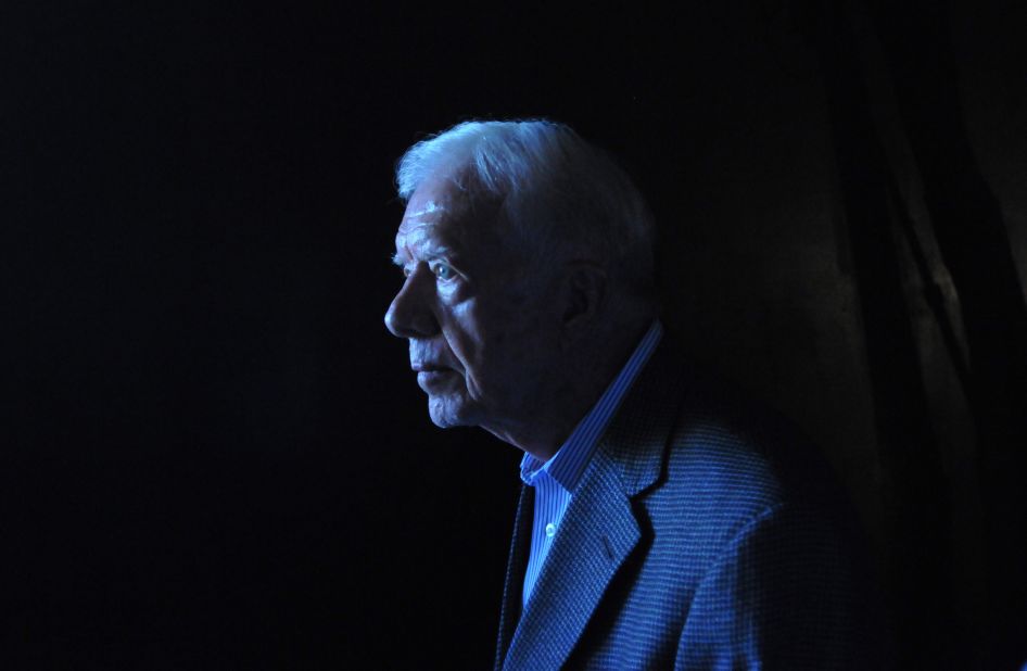 Carter walks out of the Hall of Remembrance at the Yad Vashem Holocaust memorial in Jerusalem in August 2009. The Elders, an independent council of retired world figures, kicked off a visit to Israel and the Palestinian territories in a bid to encourage Middle East peace efforts.