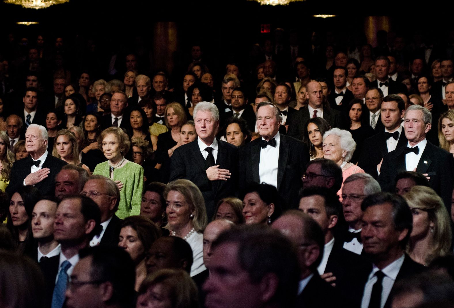 Carter and other former presidents, including Clinton and both George Bushes, attend the Points of Light Institute Tribute to Former President George H.W. Bush in March 2011.