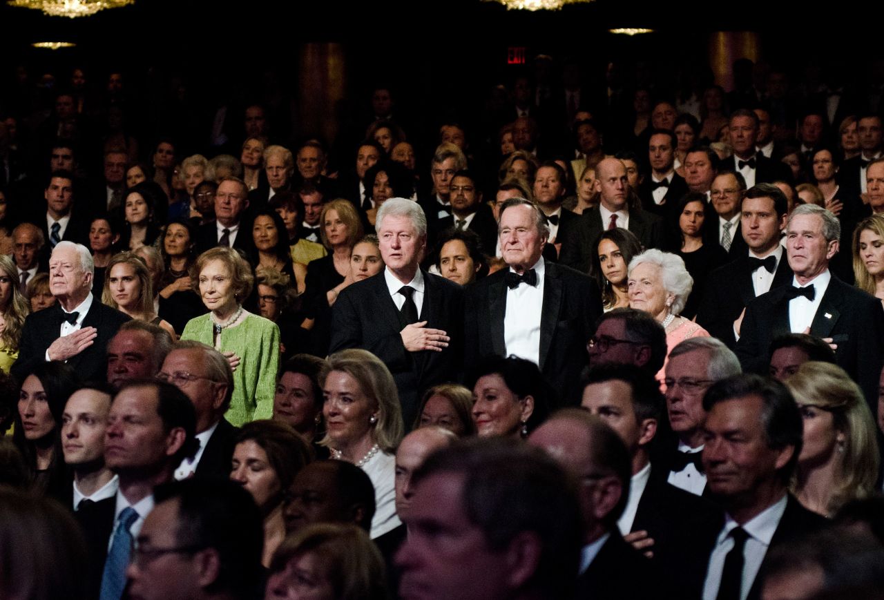 Carter and other former Presidents, including Clinton and both George Bushes, attend the Points of Light Institute Tribute to Former President George H.W. Bush in March 2011.