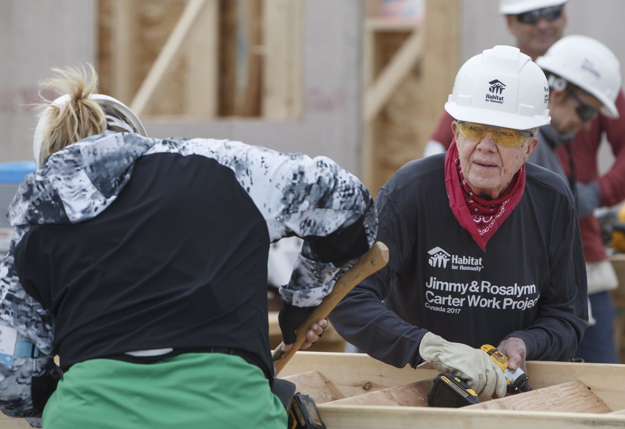 Carter helps build stairs for a home during a Habitat for Humanity project in Edmonton, Alberta, in July 2017. A couple days later, while working on another house in Canada, <a href="http://www.cnn.com/2017/07/13/politics/jimmy-carter-dehydration-habitat-for-humanity/index.html" target="_blank">Carter became dehydrated</a> and was taken to a hospital as a precaution.