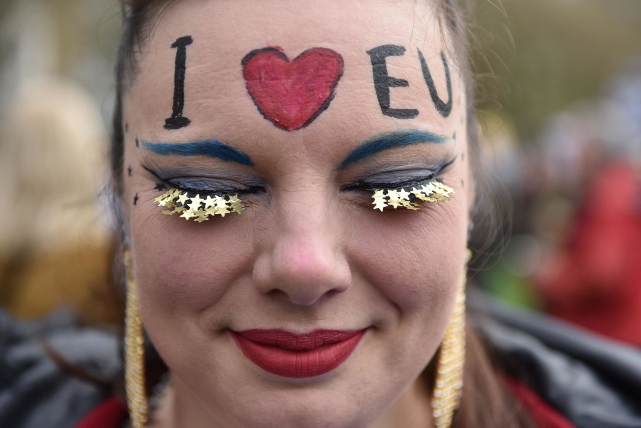 A protester takes part in the Put It To The People March on March 23 in London.