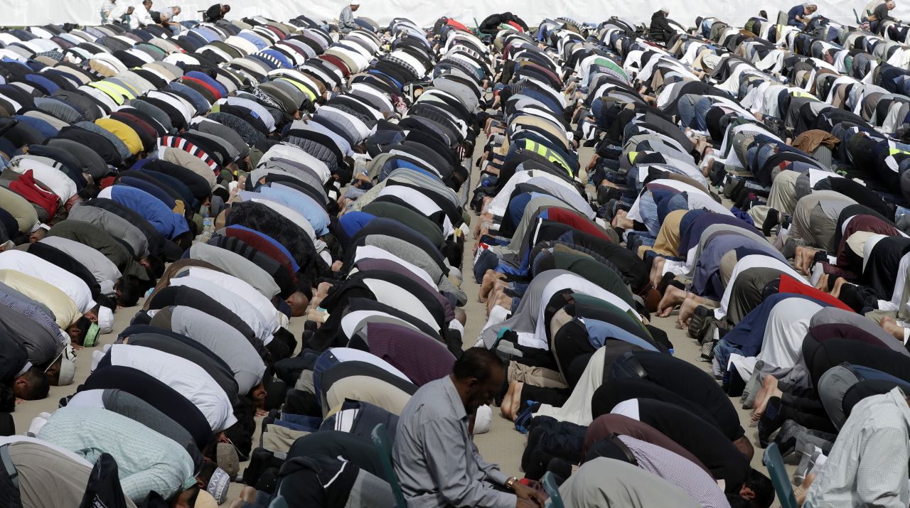 Muslims pray during Friday prayers at Hagley Park in Christchurch on March 22.