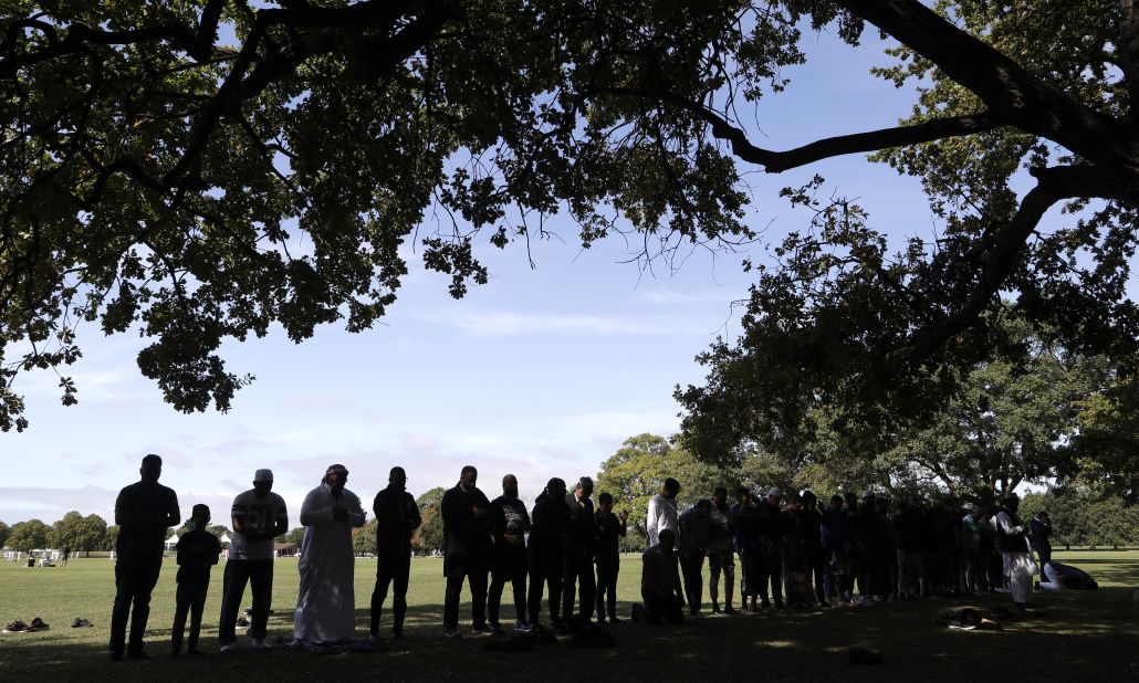 Muslim men pray in Hagley Park near Al Noor mosque in Christchurch, New Zealand, on Saturday, March 23. Most of the victims in the terror attacks died at that mosque.