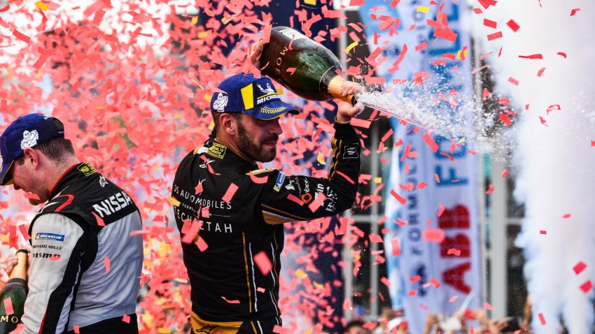 HAINAN ISLAND, CHINA - MARCH 23: Jean-Eric Vergne (FRA), DS TECHEETAH, 1st position, celebrates with Oliver Rowland (GBR), Nissan e.Dams, 2nd position  on March 23, 2019 in Hainan Island, China. (Photo by FIA ABB Formula E Handout/Getty Images)