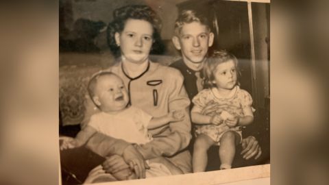 Betty and Lynn Hadfield hold their children, Kent, 3 months, and Mary Ann, 2, in 1944.
