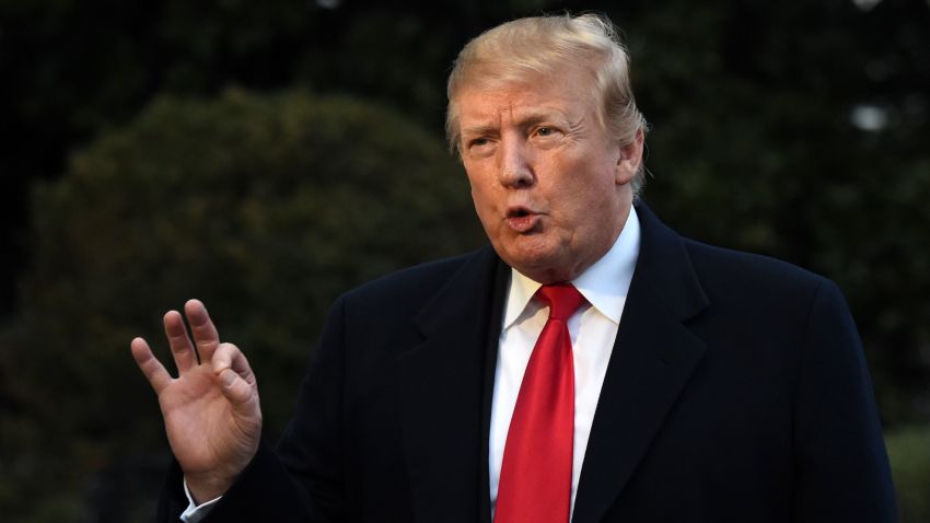 US President Donald Trump speaks to reporters upon his return to the White House on March 24, 2019 in Washington, DC after spending the weekend in Florida, declaring he had been completely exonerated after his campaign was cleared of colluding with Russia in the 2016 election campaign. (Photo by Eric BARADAT / AFP)        (Photo credit should read ERIC BARADAT/AFP/Getty Images)