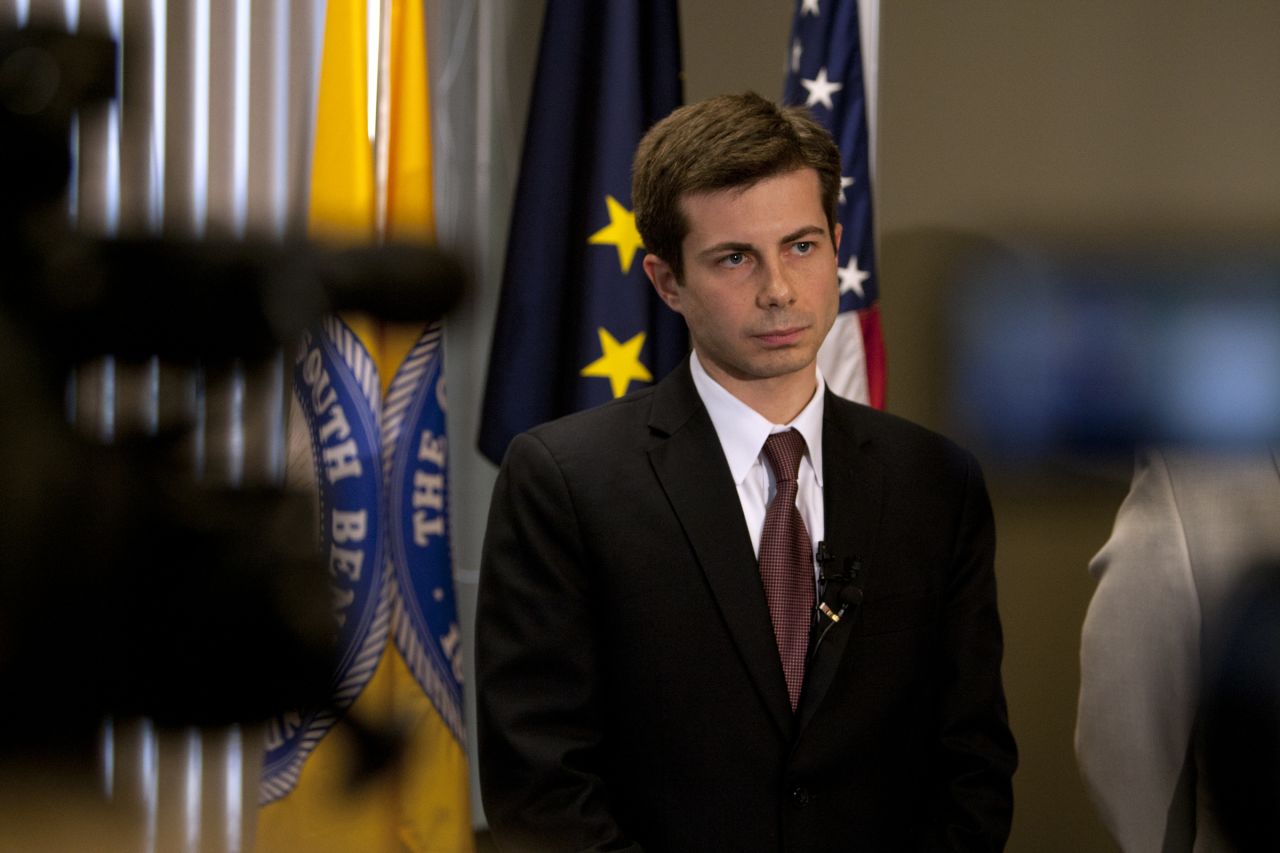 Buttigieg listens to a question during a news conference announcing an interim police chief in March 2012.