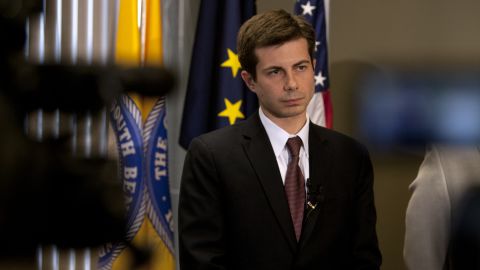 Buttigieg listens to a question during a news conference announcing an interim police chief in March 2012.