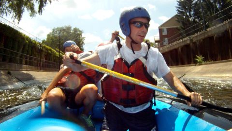 Buttigieg paddles a raft during the East Race Waterway in July 2013.