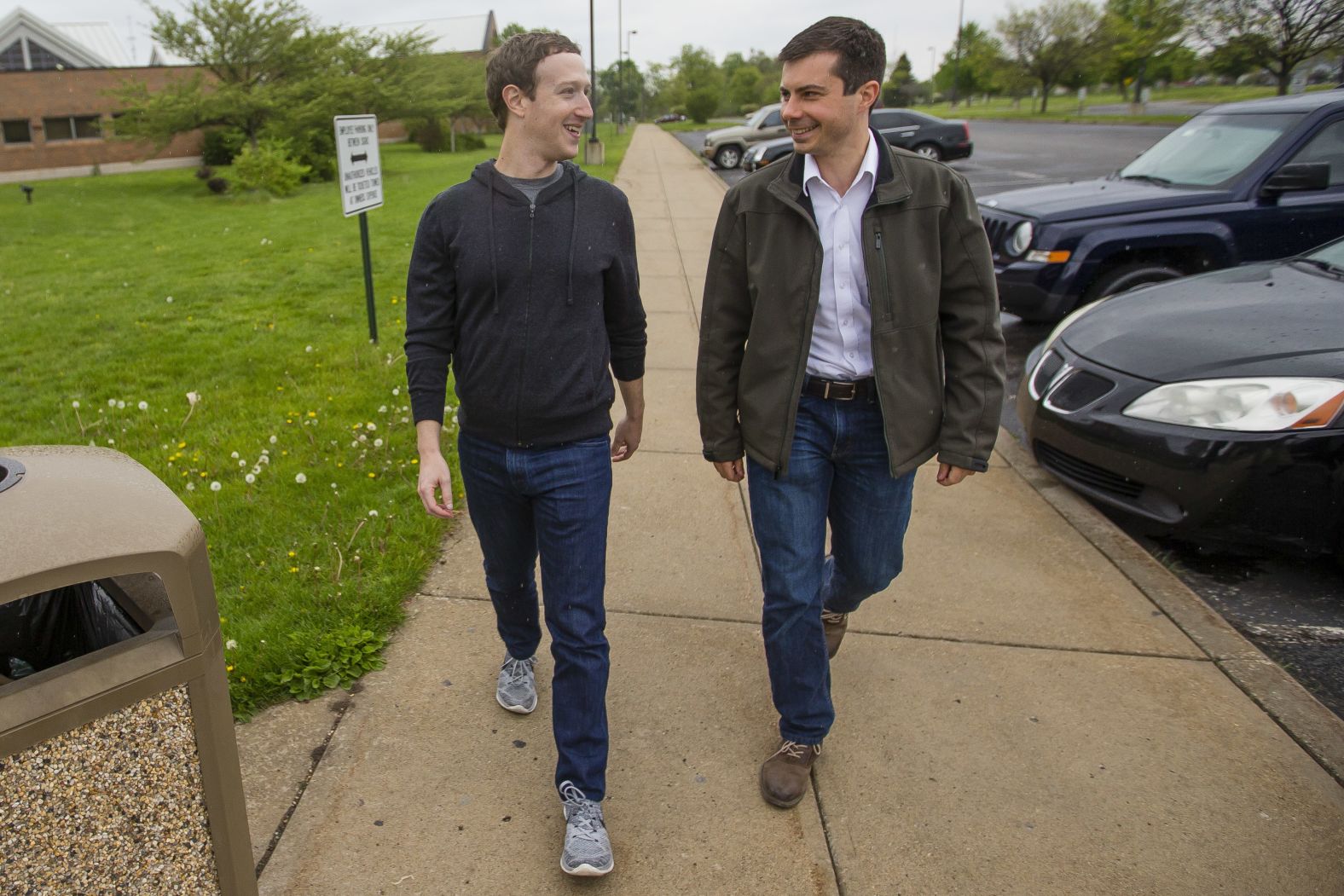 Buttigieg walks with Facebook CEO Mark Zuckerberg, a personal friend, who was <a href="index.php?page=&url=https%3A%2F%2Fwww.indystar.com%2Fstory%2Fnews%2F2017%2F05%2F01%2Fwhy-facebook-ceo-mark-zuckerberg-hanging-out-south-bend-mayor-pete-buttigieg-and-elkhart-firefighters%2F101145566%2F" target="_blank" target="_blank">visiting South Bend</a> in April 2017.