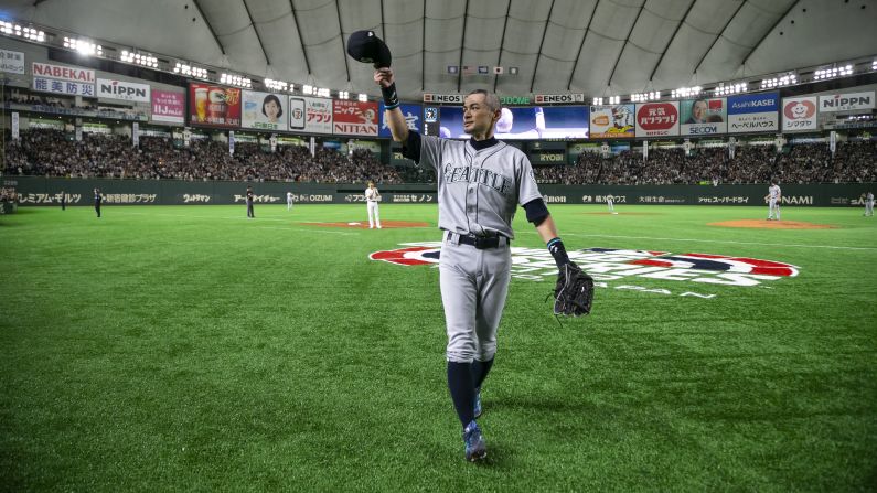 Seattle Mariners outfielder Ichiro Suzuki acknowledges fans while exiting the field during the eighth inning of a game against the Oakland Athletics at Tokyo Dome on March 21. On Thursday, the veteran outfielder <a target="_blank">announced his retirement</a> after playing 19 seasons in the MLB.