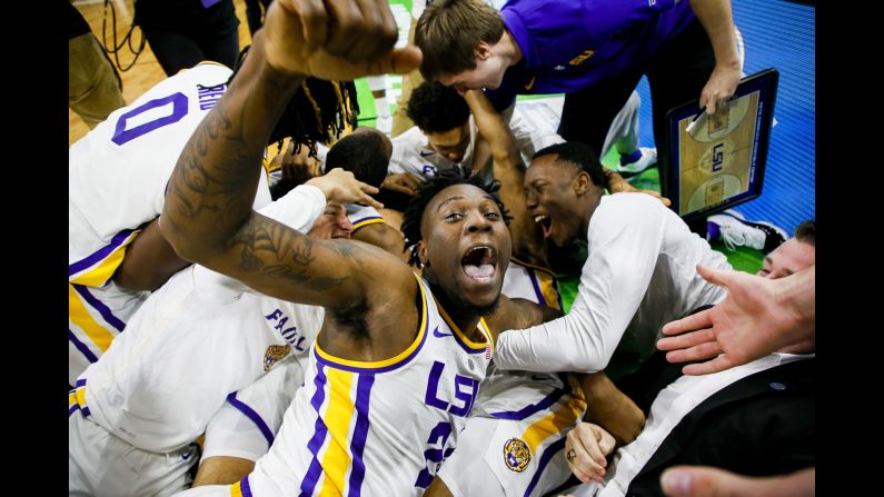 LSU Tigers forward Emmitt Williams celebrates with his teammates after defeating the Maryland Terrapins in the second round of the NCAA Men's Basketball Tournament on Saturday, March 23, in Jacksonville, Florida. LSU sophomore Tremont Waters hit a <a  target="_blank" target="_blank">game-winning shot</a> in the final seconds of the game to advance the Tigers to the Sweet 16.