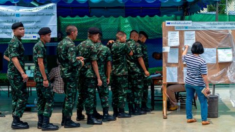 Soldiers flock to polling precincts to cast their vote on March 24 in Bangkok.