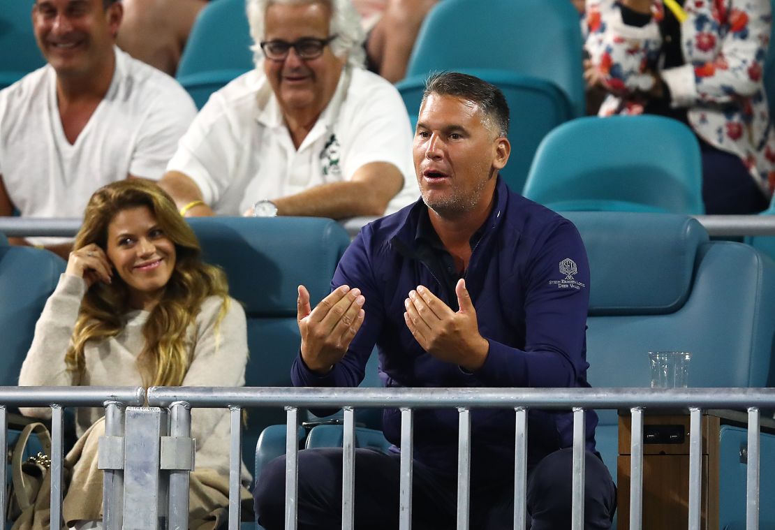 A spectator goads Kyrgios -- while the woman sitting next to him looks somewhat embarrassed