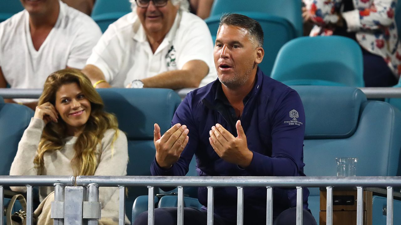 A spectator goads Kyrgios -- while the woman sitting next to him looks somewhat embarrassed