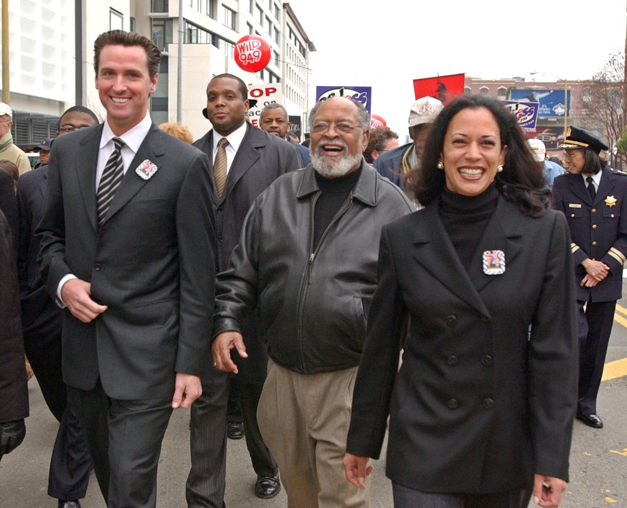 Harris is joined by San Francisco Mayor Gavin Newsom, left, and the Rev. Cecil  Williams, center, for a San Francisco march celebrating Martin Luther King Jr. in January 2004. Harris was the city's district attorney from 2004 to 2011.