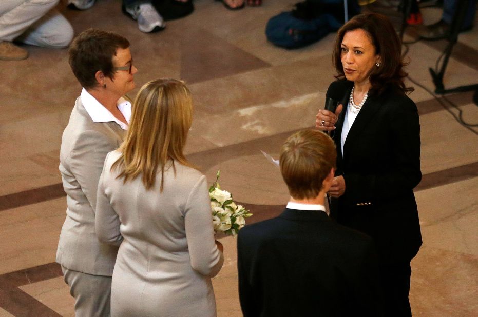 Harris officiates the wedding of Kris Perry, left, and Sandy Stier in June 2013. Perry and Stier were married after a federal appeals court cleared the way for California to immediately resume issuing marriage licenses to same-sex couples.