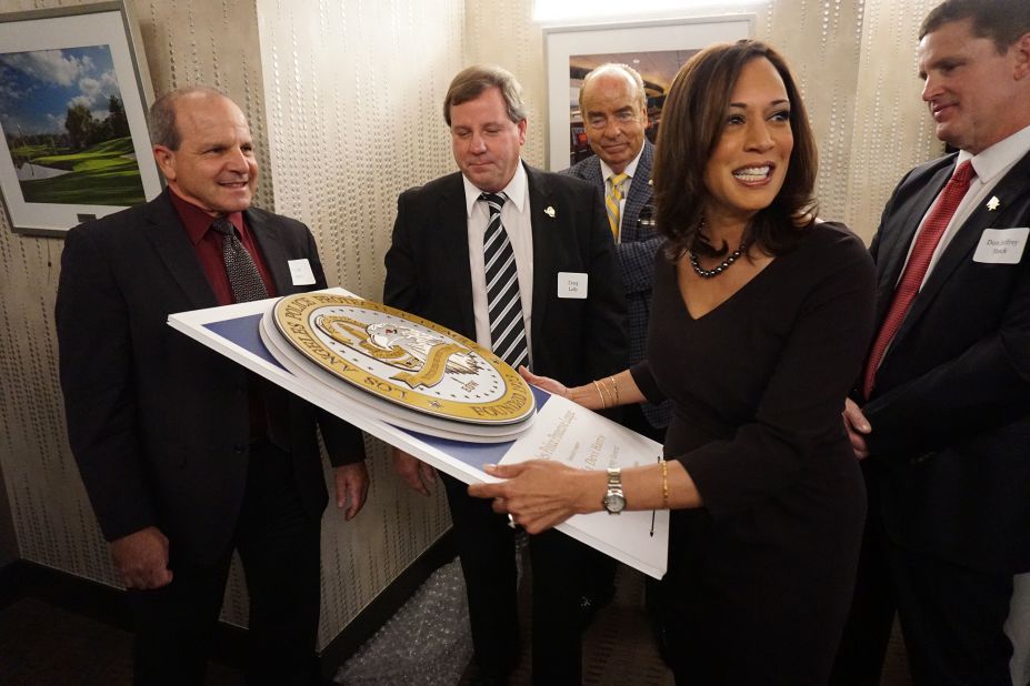 Harris receives a gift from supporters in January 2015, after she announced plans to run for the US Senate.