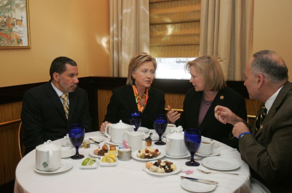 Gillibrand talks with Hillary Clinton during a lunch meeting that included New York Gov. David Paterson, left, and US Sen. Chuck Schumer in January 2009. Paterson appointed Gillibrand to replace Clinton as US senator. Gillibrand later won a special primary election in 2010 and was re-elected in 2012.