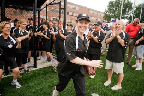 Gillibrand takes the field for the Congressional Women's Softball Game in 2011. The charity game pits female members of Congress against female journalists in Washington.